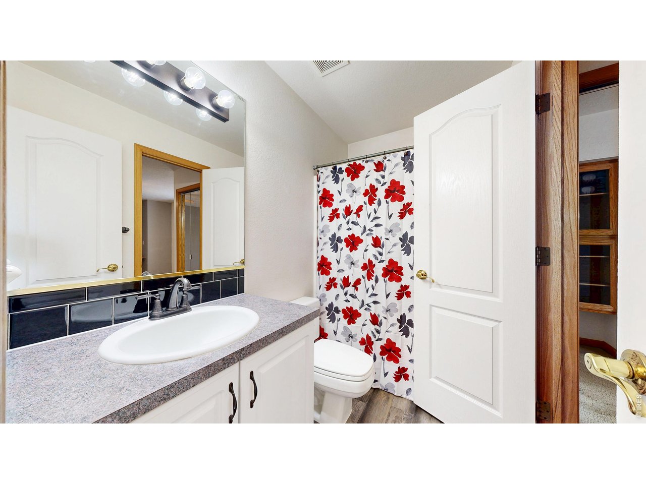 5017 West 6th Street Road Greeley, CO 80634 - Photo 32 of 42 Upstairs shared bathroom