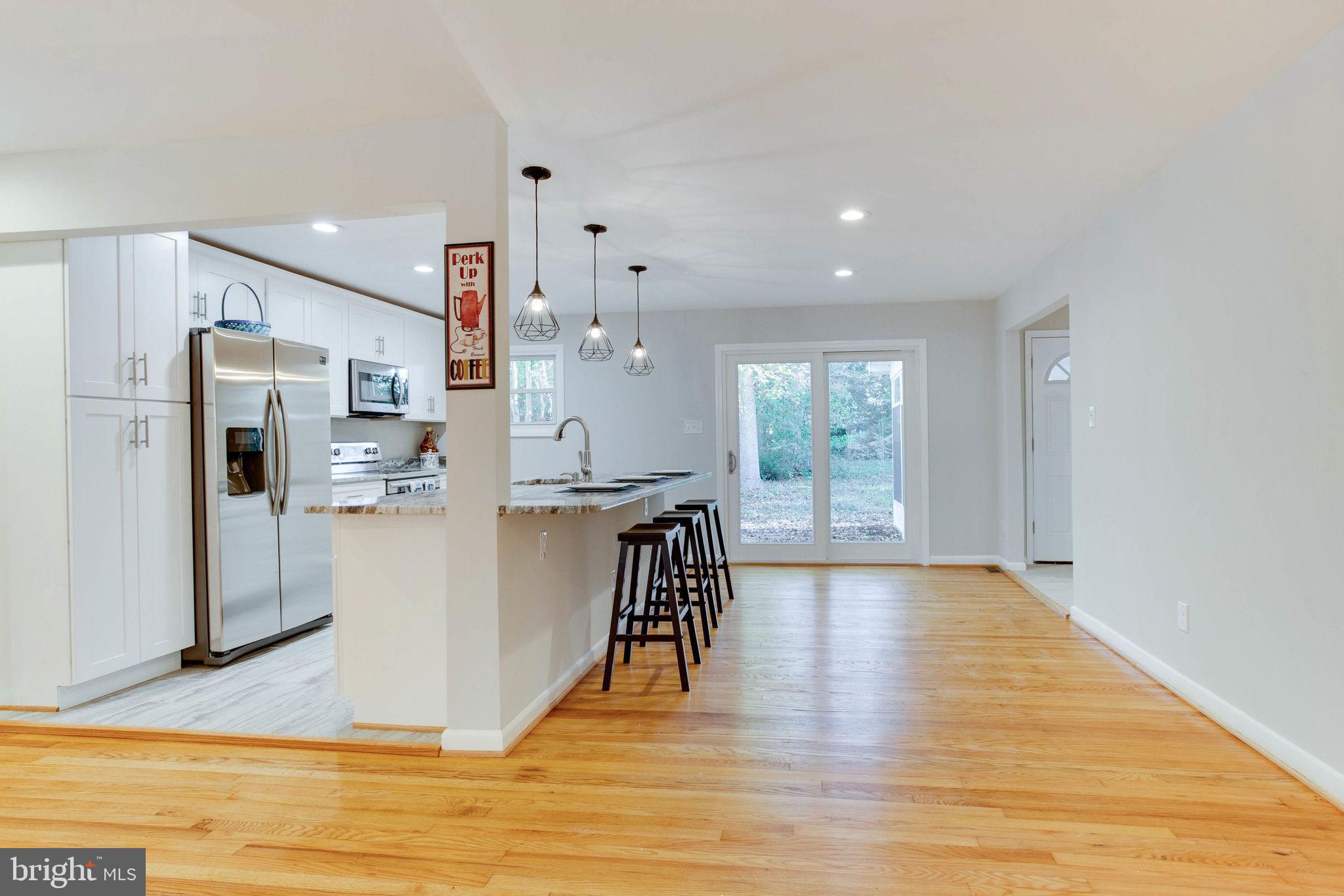 158 Calhoun Street Edgewater, MD 21037 - Photo 9 of 43 Kitchen with hardwood floor+recessed lights