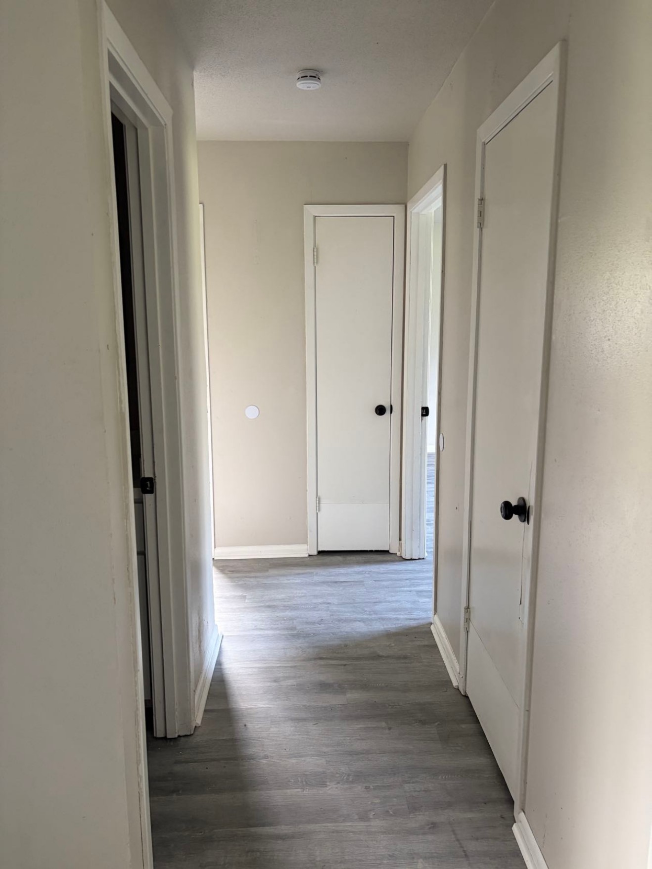 5890 Helbig Road Beaumont, TX 77708 - Photo 13 of 31 a view of hallway with wooden floor