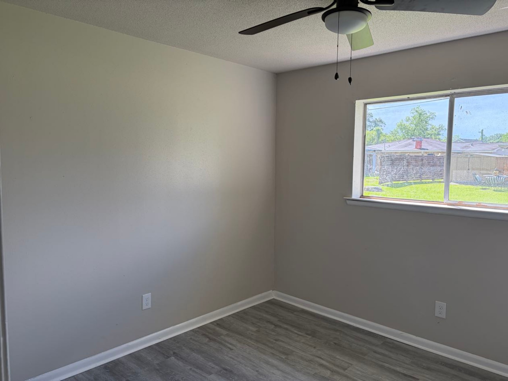 5890 Helbig Road Beaumont, TX 77708 - Photo 22 of 31 a view of an empty room with a window