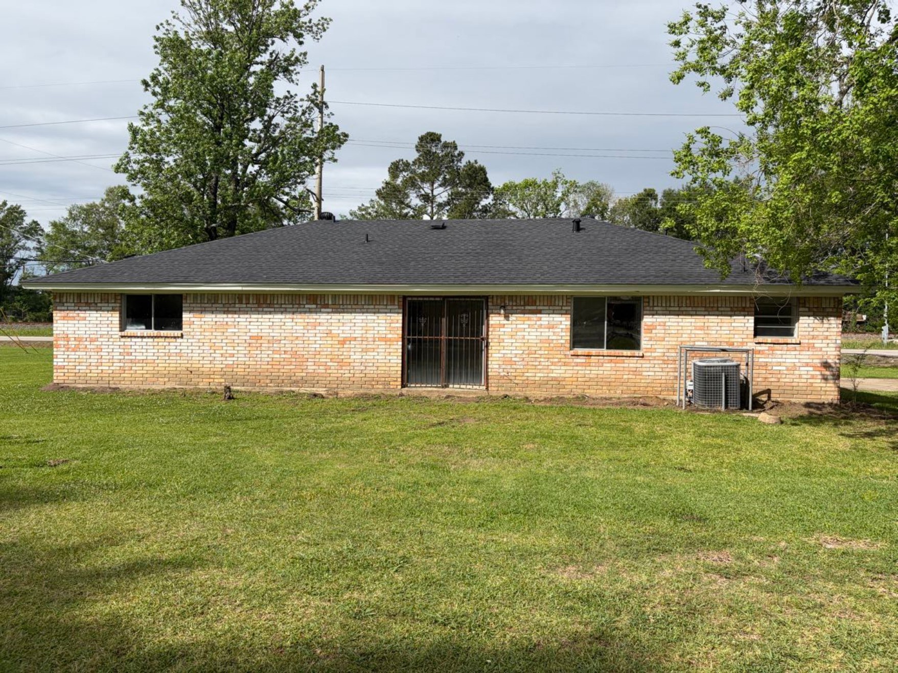 5890 Helbig Road Beaumont, TX 77708 - Photo 30 of 31 a front view of a house with a garden