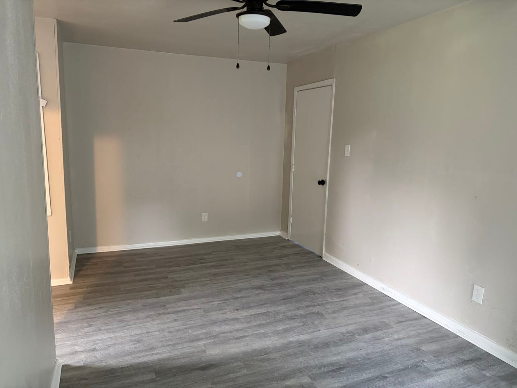 5890 Helbig Road Beaumont, TX 77708 - Photo 4 of 31 a view of an empty room and wooden floor