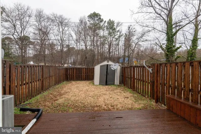 a view of a wooden fence