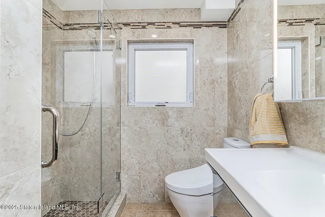 a view of a workspace with furniture