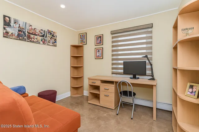 a living room with furniture and a closet