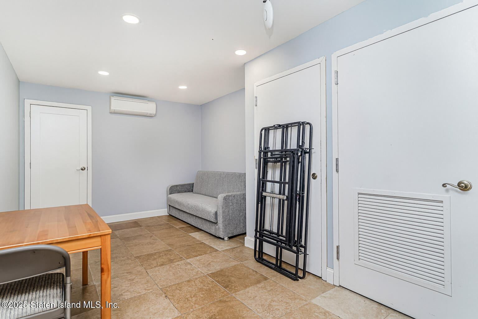 Undisclosed Address Staten Island, NY 10309 - Photo 17 of 40 a view of a livingroom with furniture and staircase
