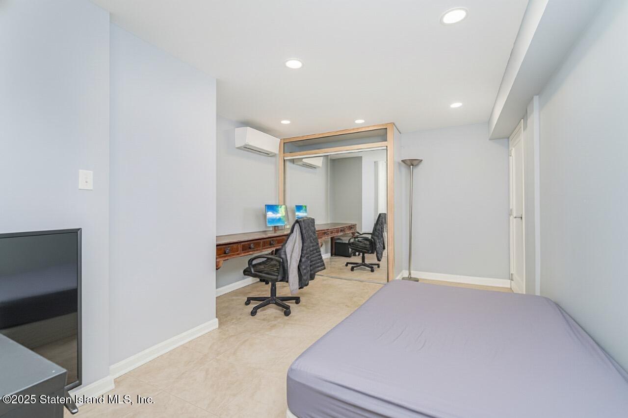 Undisclosed Address Staten Island, NY 10309 - Photo 21 of 40 a view of a room with gym equipment