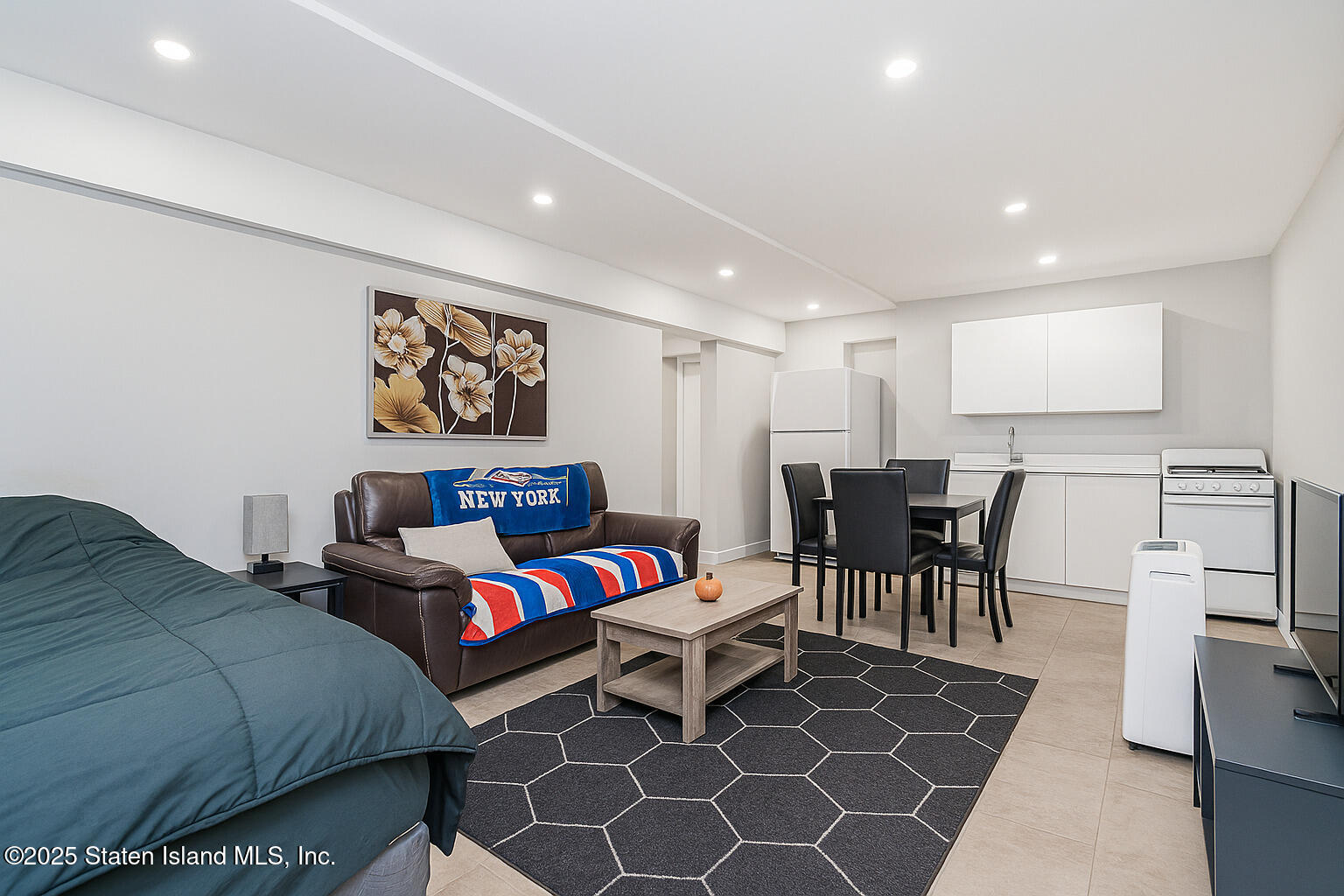 Undisclosed Address Staten Island, NY 10309 - Photo 22 of 40 a bed room with a bed and furniture