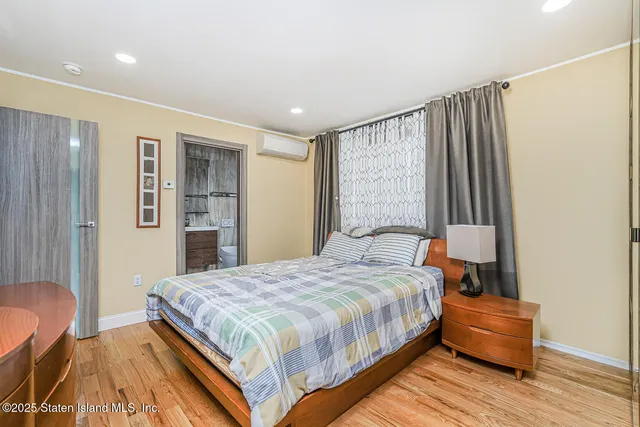 a bedroom with a bed and furniture