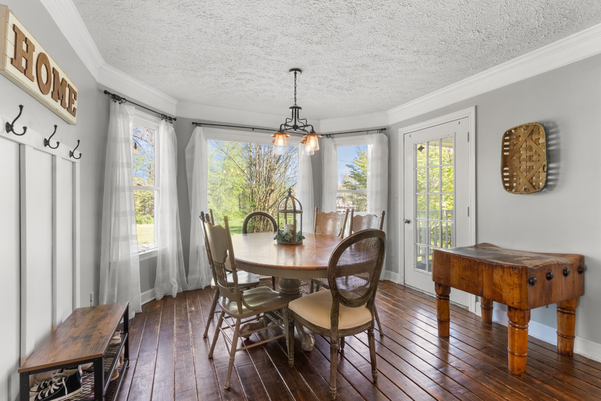 3860 Head Road Adams, TN 37010 - Photo 11 of 32 a view of a dining room with furniture window and wooden floor