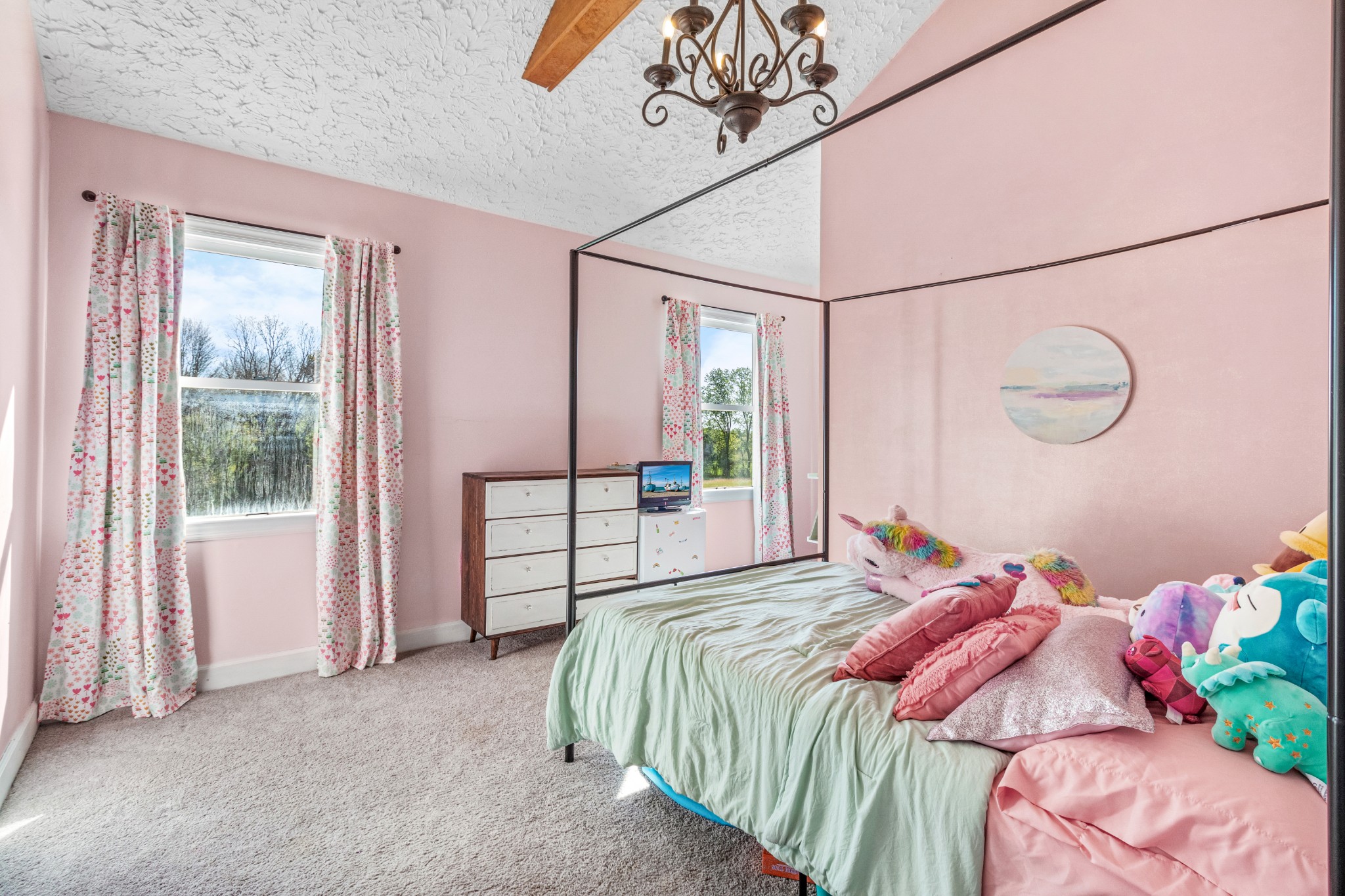 3860 Head Road Adams, TN 37010 - Photo 17 of 32 a bed sitting in a bedroom next to a window