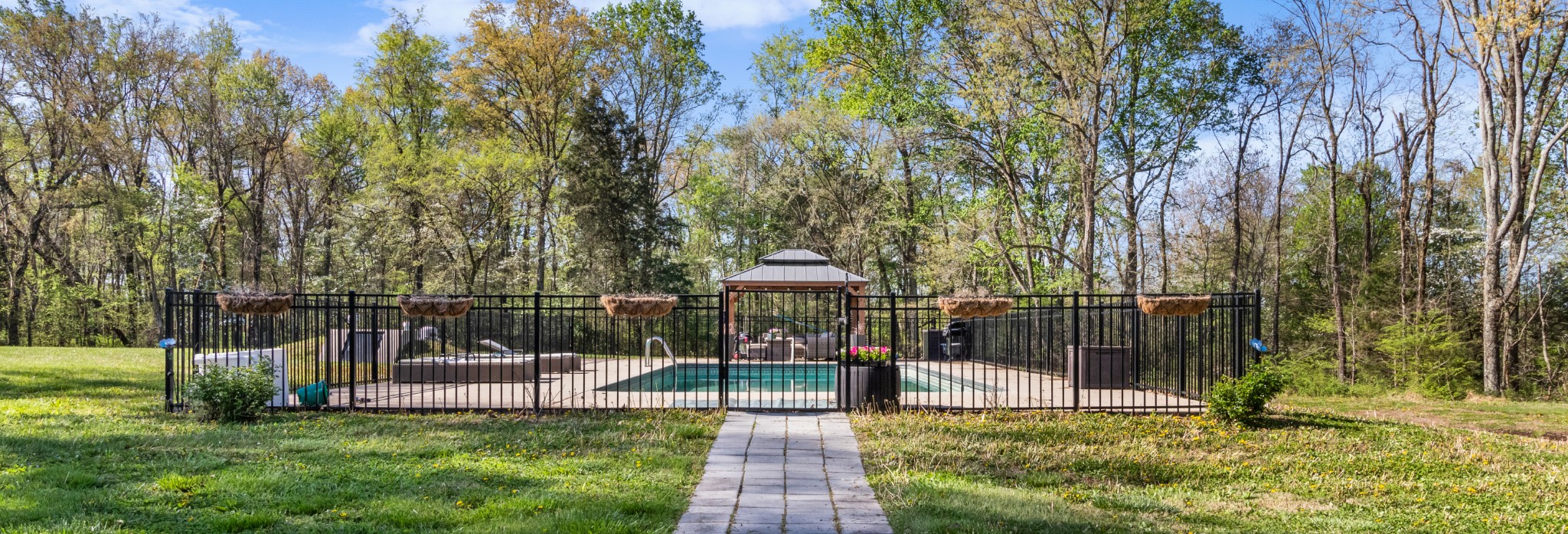 3860 Head Road Adams, TN 37010 - Photo 24 of 32 a view of a chair and table in the garden