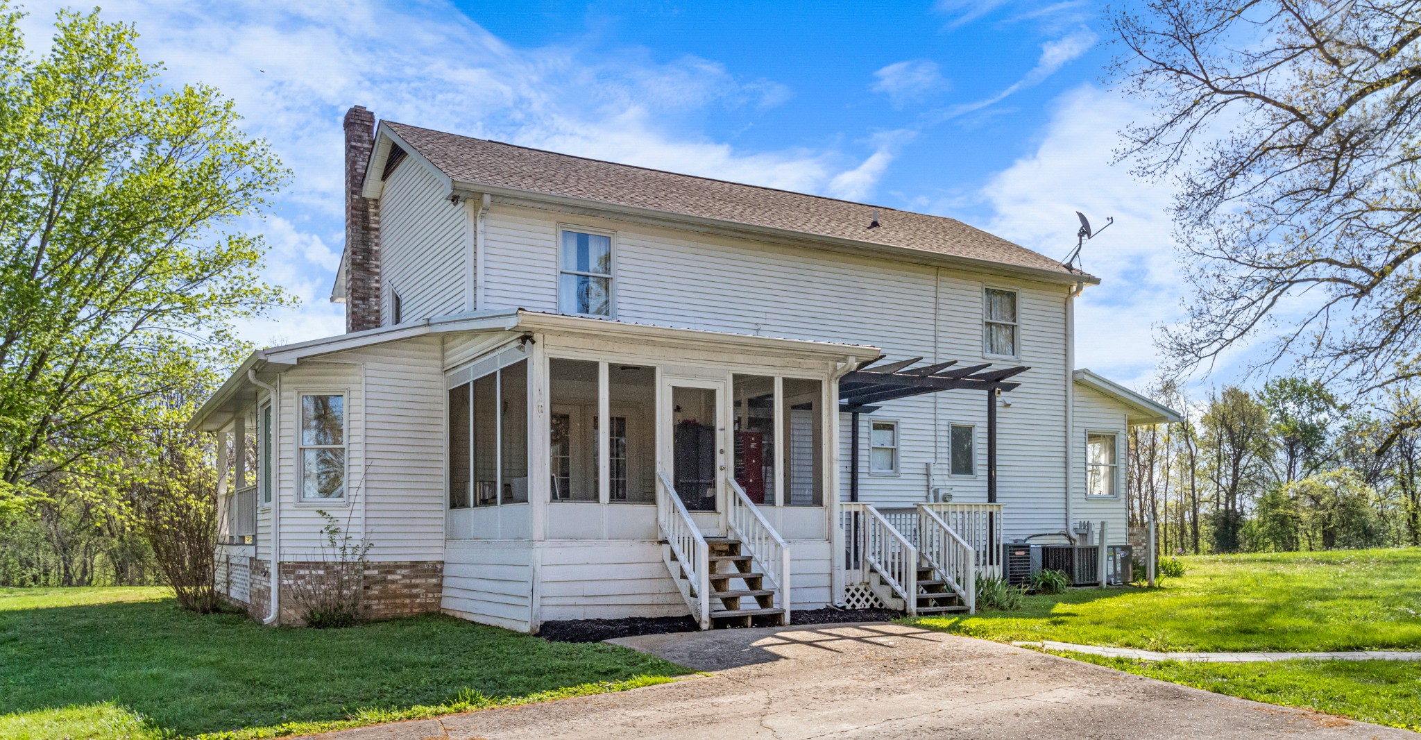 3860 Head Road Adams, TN 37010 - Photo 29 of 32 a front view of a house with a yard