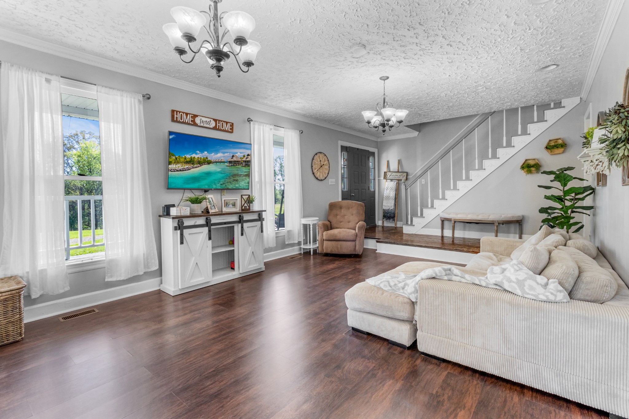 3860 Head Road Adams, TN 37010 - Photo 7 of 32 a living room with furniture and a chandelier