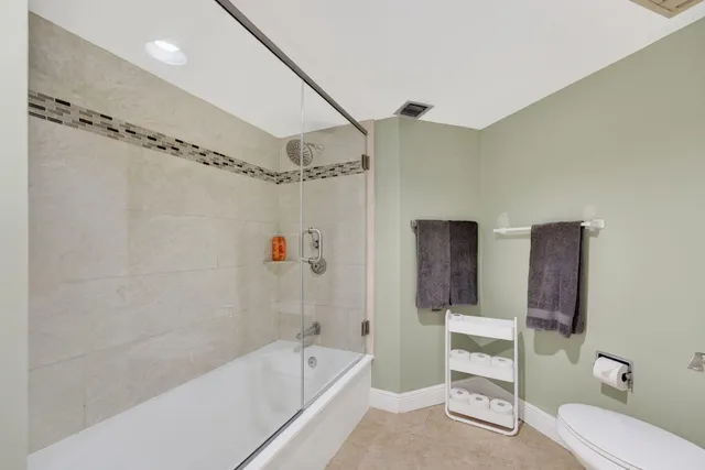 a view of a living room and balcony