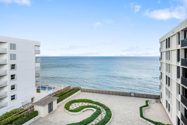 3610 South Ocean Boulevard, Unit 610 South Palm Beach, FL 33480 - Photo 14 of 14 a bathroom with a sink and a mirror