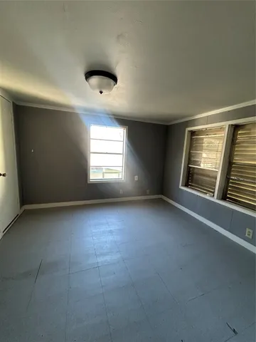 a kitchen that has a stove and a refrigerator