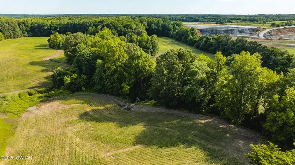 a view of a swimming pool with an outdoor space and seating area