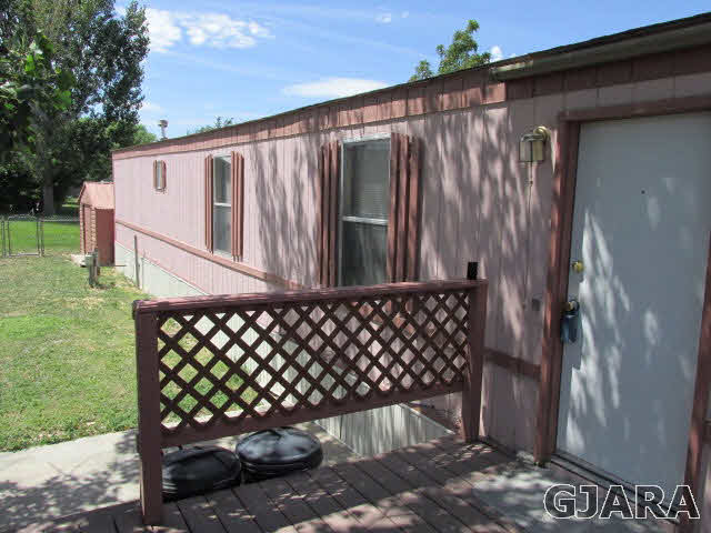 424 32 Road, Unit 151 Clifton, CO 81520 - Photo 10 of 12 a view of a wooden fence