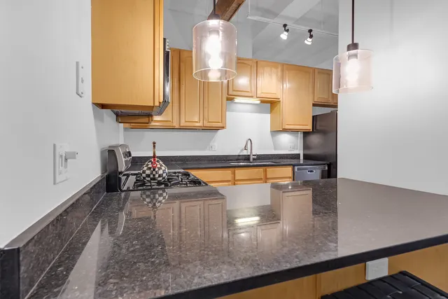 a bed room with a bed and a lamp