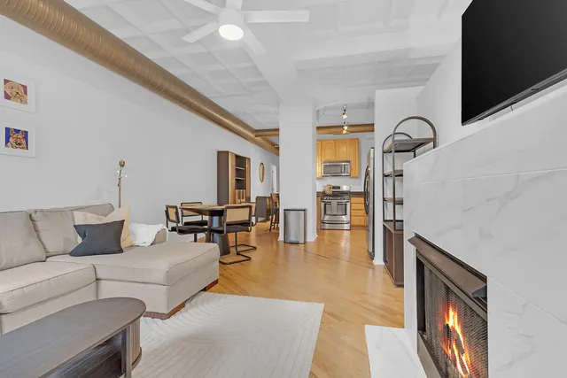 a view of a garage with parked cars