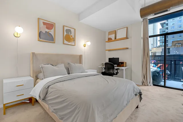 a view of an empty room with a fireplace