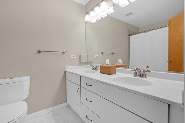 a view of city with tall buildings