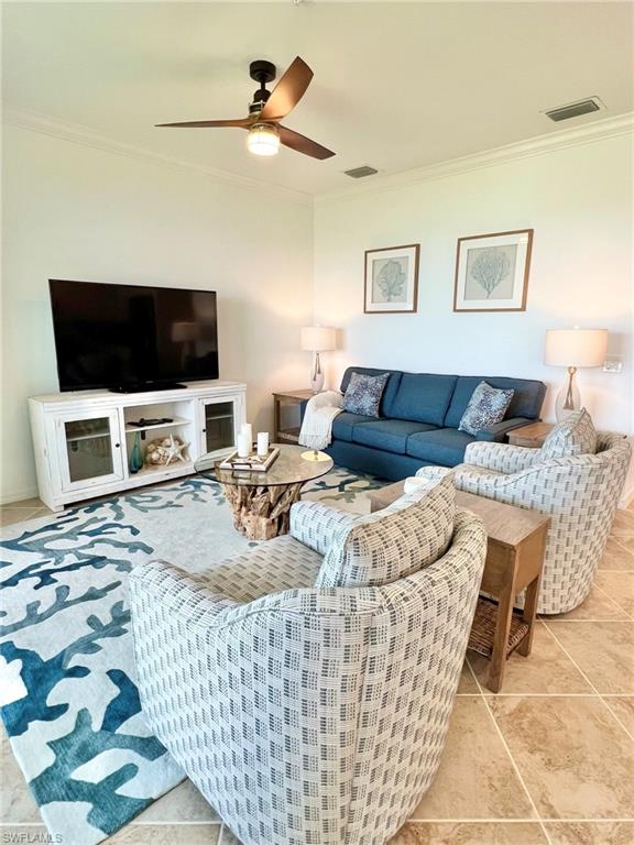 43020 Greenway Boulevard, Unit 345 Babcock Ranch, FL 33982 - Photo 2 of 42 a living room with furniture and a flat screen tv