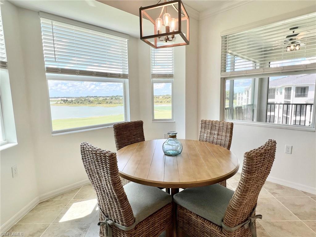 43020 Greenway Boulevard, Unit 345 Babcock Ranch, FL 33982 - Photo 6 of 42 a view of a dining room with furniture and window