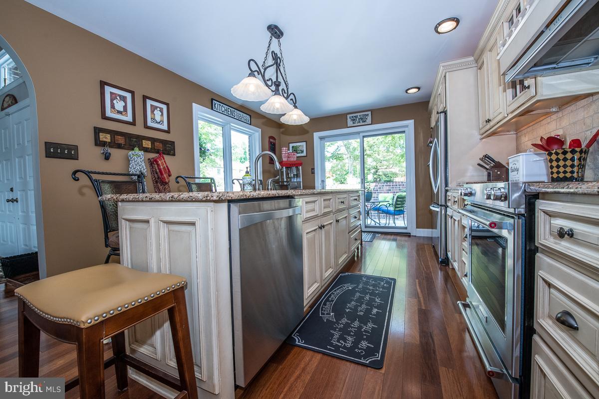 1326 Heyward Road Chesterbrook, PA 19087 - Photo 8 of 46 10 ft curved granite island with sink