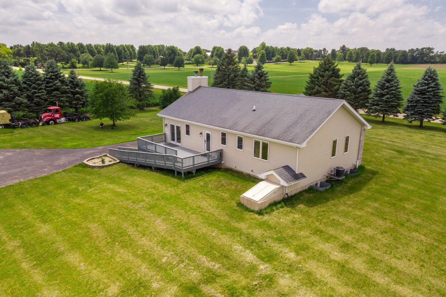 16649 Beaverton Road Capron, IL 61012 - Photo 33 of 48 an aerial view of a house with swimming pool and garden