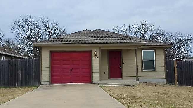 306 Wyeth Street Taylor, TX 76574 - Photo 1 of 20 Front of Home