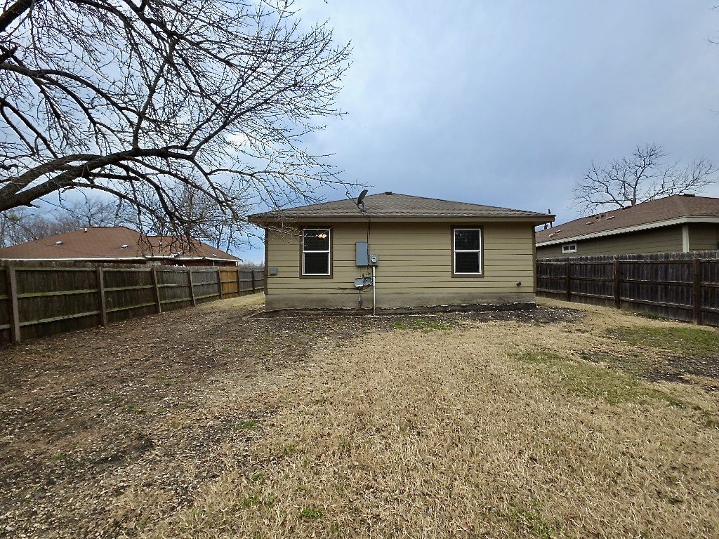 306 Wyeth Street Taylor, TX 76574 - Photo 18 of 20 Back of home with large fenced backyard