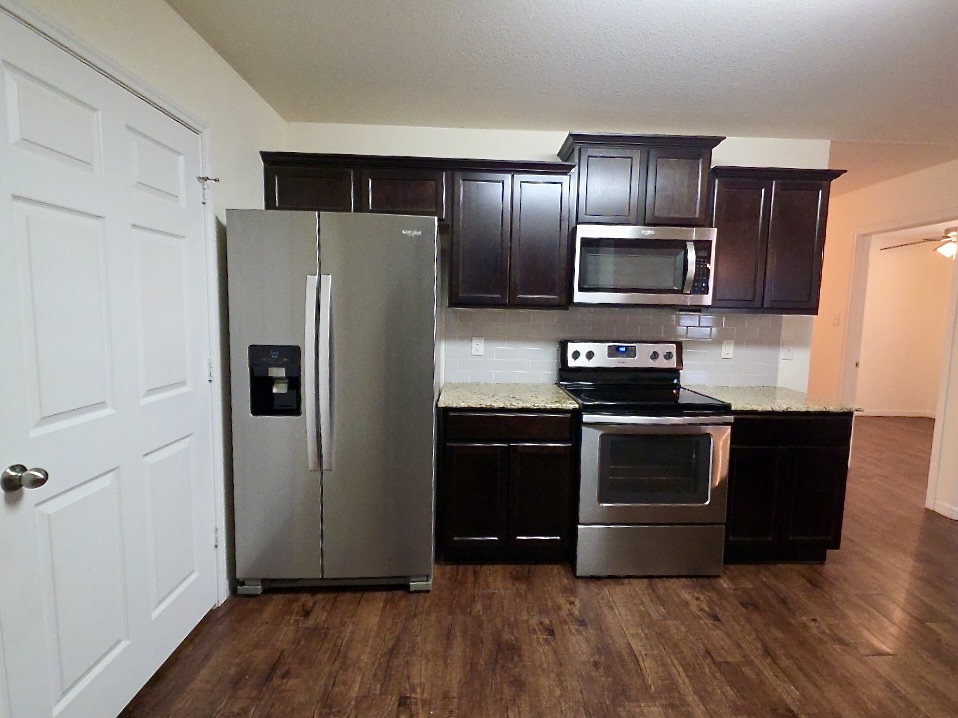306 Wyeth Street Taylor, TX 76574 - Photo 5 of 20 Spacious kitchen with modern appliances.