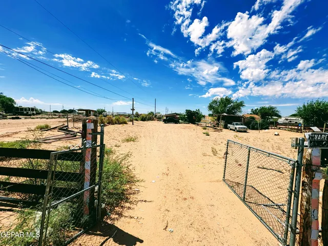 a view of swimming pool with an outdoor seating