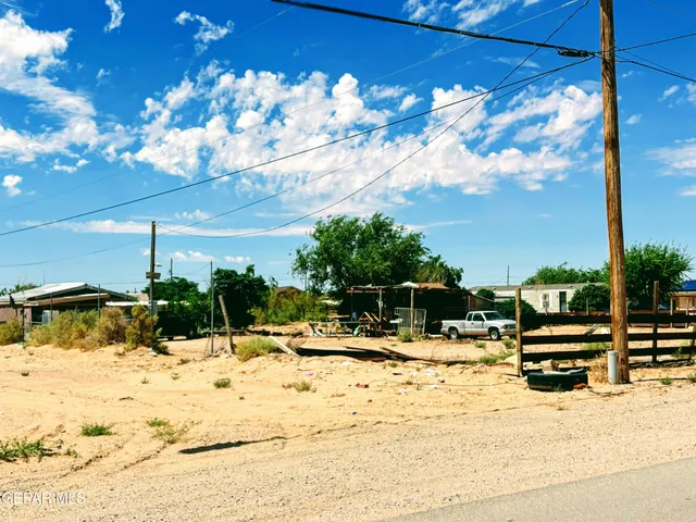 a view of swimming pool with a patio