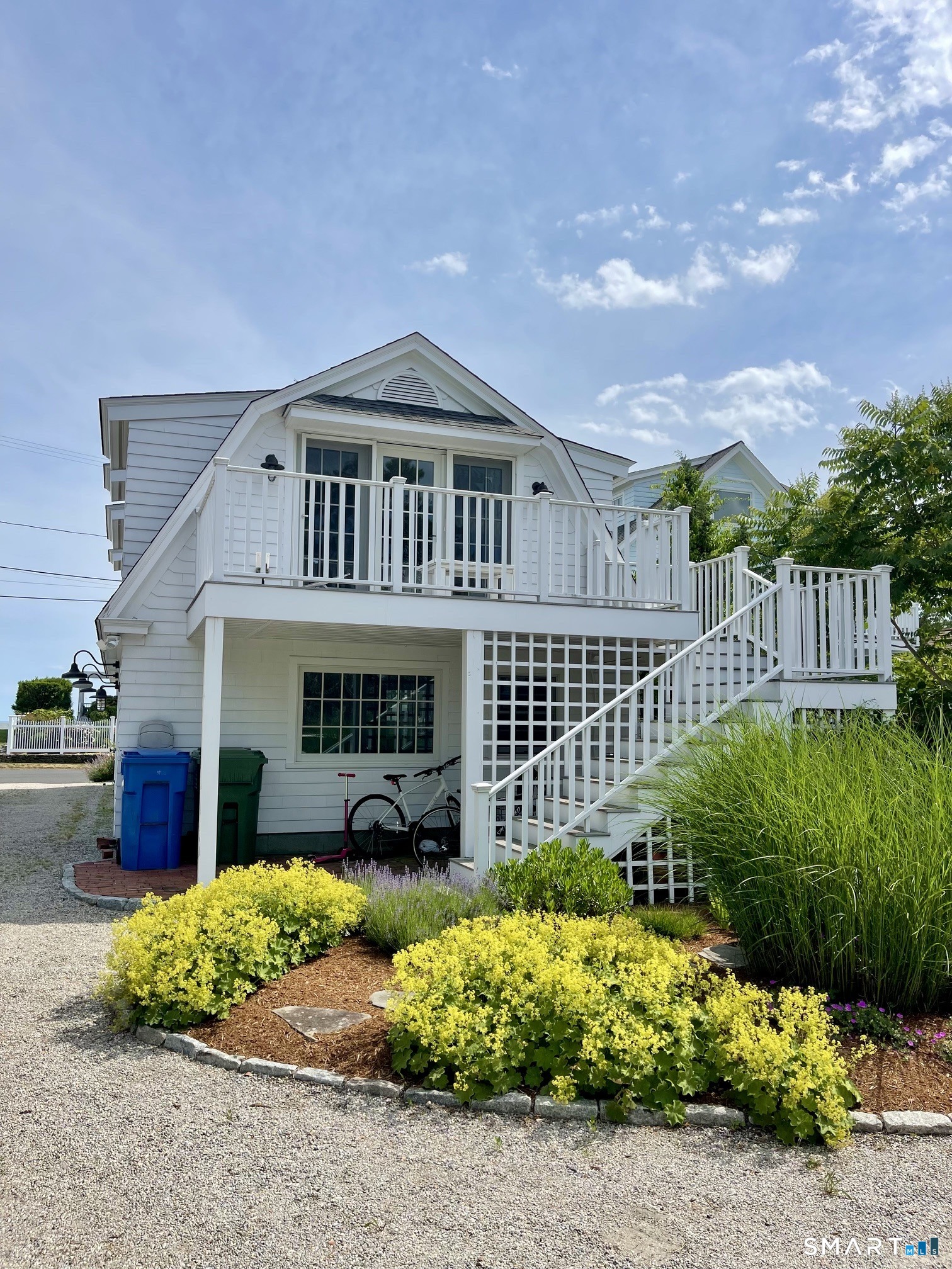 165 Middle Beach Road Madison, CT 06443 - Photo 2 of 14 The entrance to the apartment is up the stairs on the back of the structure.