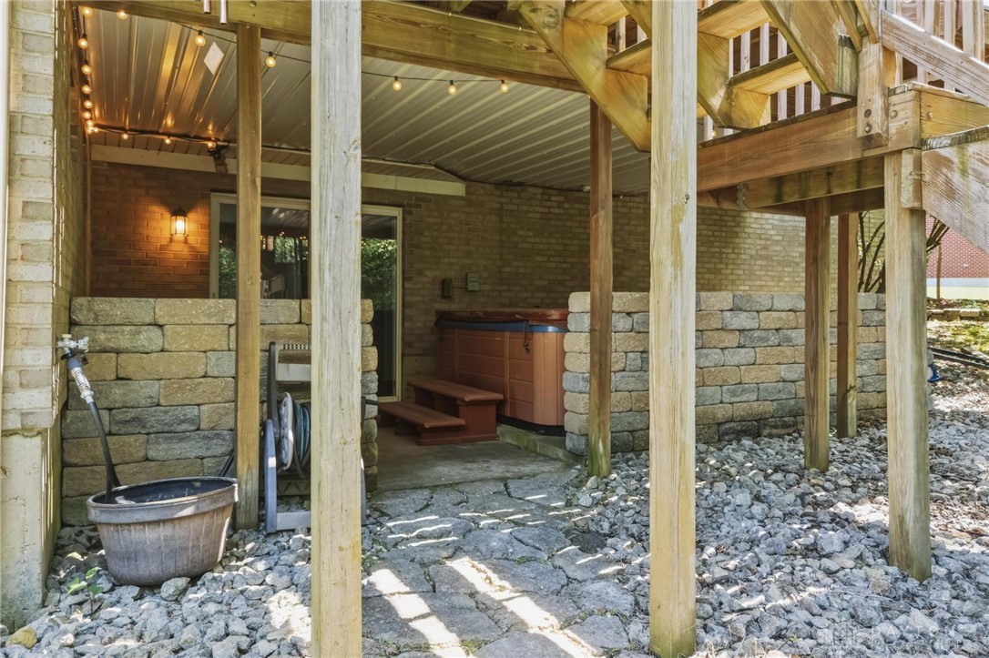 70 Martin Lane Springboro, OH 45066 - Photo 58 of 69 This outdoor area offers a relaxing space with a hot tub, perfect for unwinding.