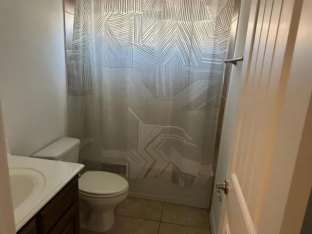 a bathroom with a sink and toilet