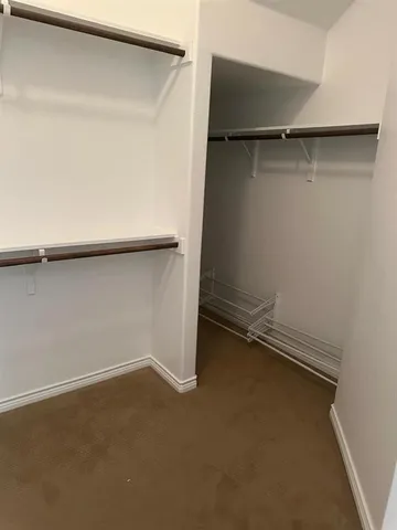 a bathroom with a bathtub and a sink