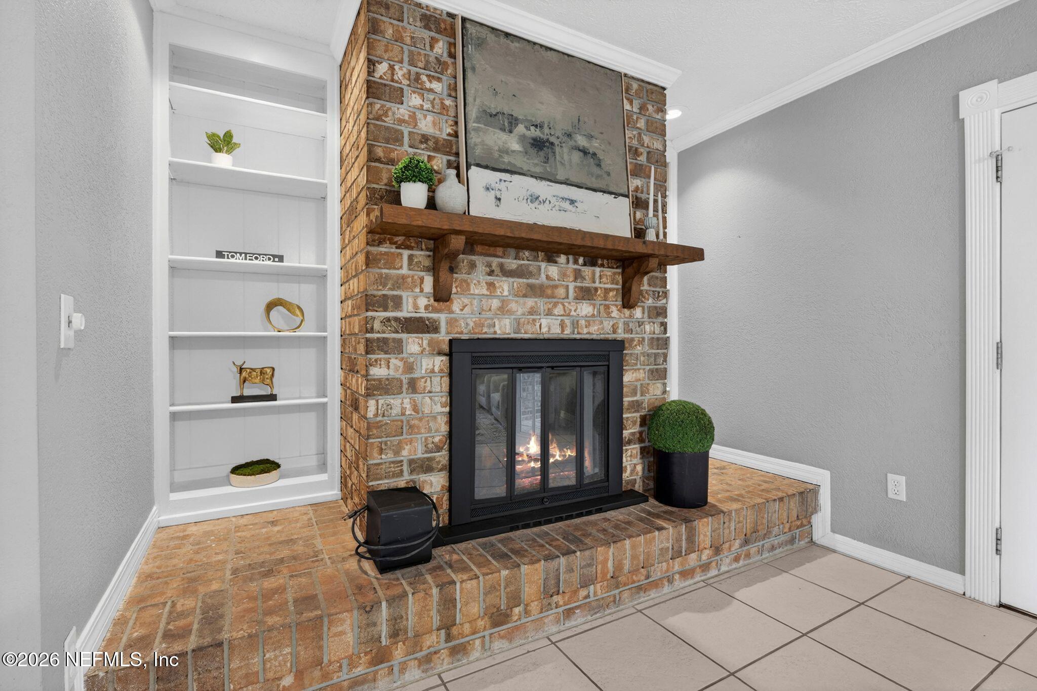 138 Ridgefield Court Orange Park, FL 32065 - Photo 14 of 64 a view of livingroom with furniture and a fireplace