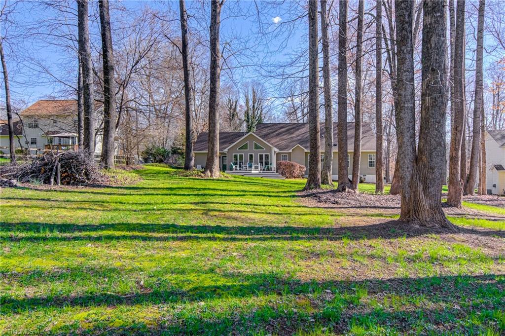 7503 Bartonshire Court Oak Ridge, NC 27310 - Photo 24 of 24 Deep backyard with lots of room to roam.
