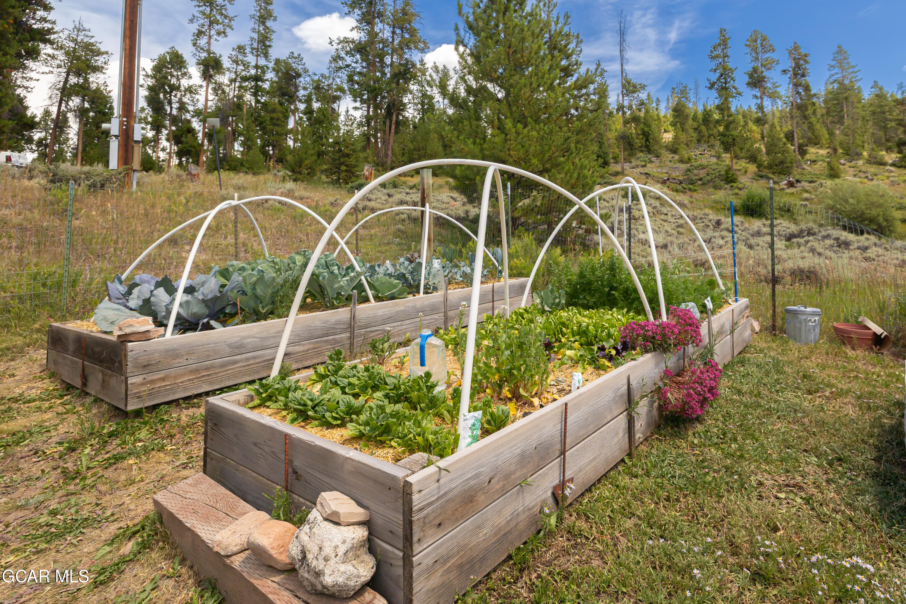 732 Gcr 8311/ Clayton Ranch Road Tabernash, CO 80478 - Photo 56 of 65 a view of a garden with patio