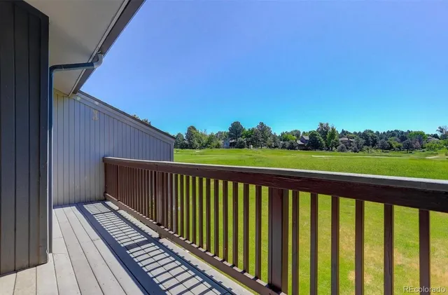 a view of a porch with a yard