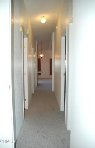 a view of a hallway with a elevator