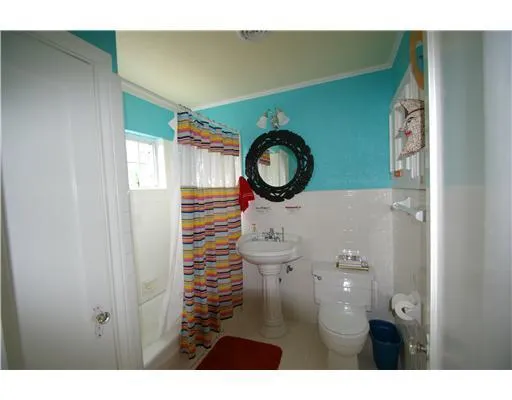 a bathroom with a toilet and a sink