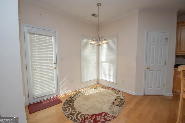 a view of an empty room and window