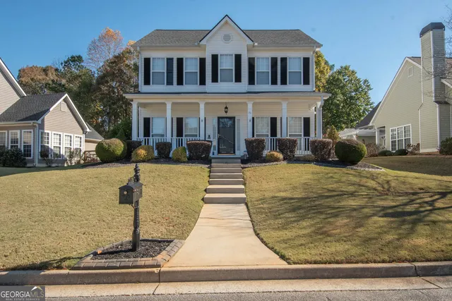 a front view of a house with entertaining space