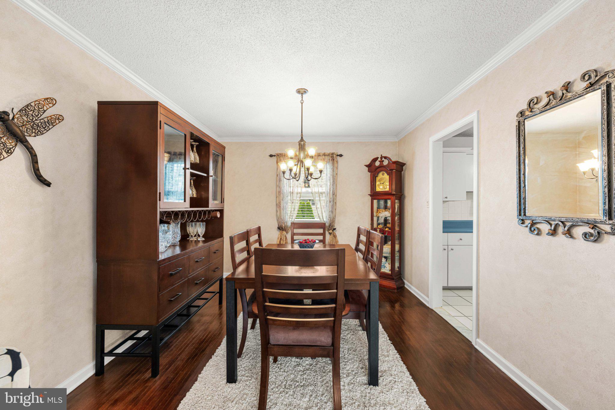 8 Dan Road Hamilton, NJ 08620 - Photo 11 of 49 Elegant dining space with warm tones.