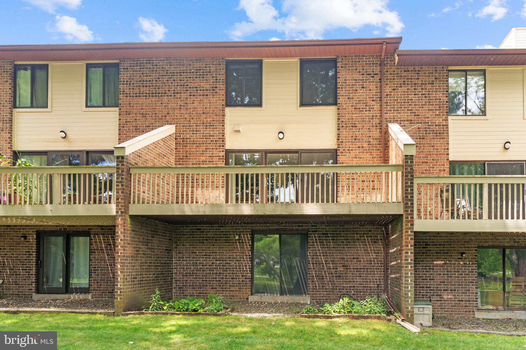 14 Elan Lane Chesterbrook, PA 19087 - Photo 30 of 31 Charming brick townhome with balconies.
